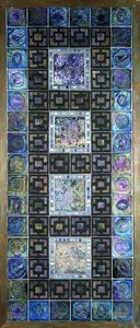 Et Favrile glassflispanel, støpt med blomster og geometriske design, 1900-tallet