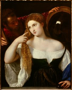 Portrett av en kvinne med toalettet Et speil bak reflekterer scenen. En tjener holder et annet speil for henne, hun ser stille på seg selv. Den unge kvinnen skulle være Laura Dianti, elskerinnen til Alfonso I d