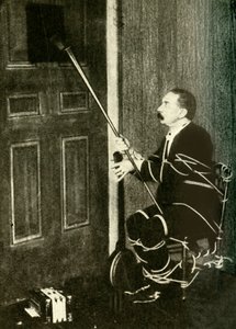 John Nevil Maskelyne fremfører en åndekabinettillusjon, c1910. av Unbekannt