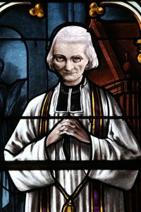 Mezilles kirke. Glassmaleri. Saint John Mary Vianney. Cure of Ars. Frankrike - Abbe Jean Marie Vianney (Vianey, Viannay, Wien), kjent som Cure d'Ars (1786-1859). av Unbekannt