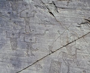 Italia, Lombardia-regionen, Valcamonica, nærbilde av steintegninger i Naquane nasjonalpark av Benjamin Baud
