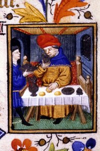 Januar måneds forestilling. En tjener legger mat på sin herres bord. Miniatyr av et manuskript fra 1300-tallet. av Unknown artist