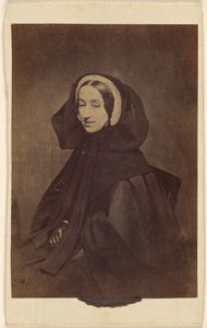 [Uidentifisert kvinne kledd i mørke klær, sittende] av Unknown artist