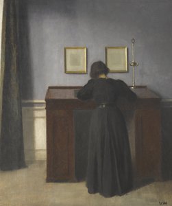 Ida står ved et skrivebord av Vilhelm Hammershøi