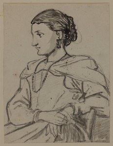 Sittende kvinnefigur