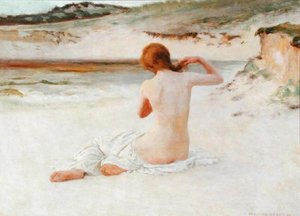 Naken på en strand