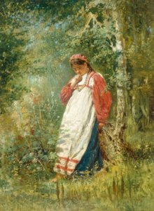 Ung kvinne i skogen