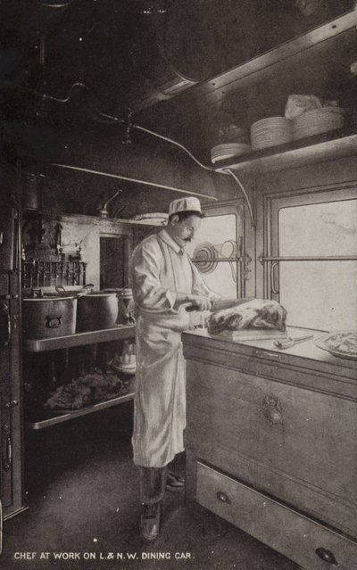 Kokk på jobb på L og NW Dining Car (s/hv-bilde) av (after) English photographer