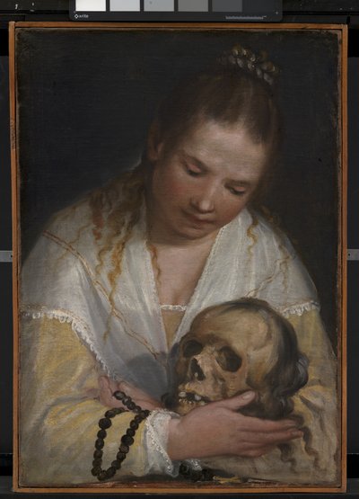 En ung kvinne som vurderer en hodeskalle av Alessandro Casolani