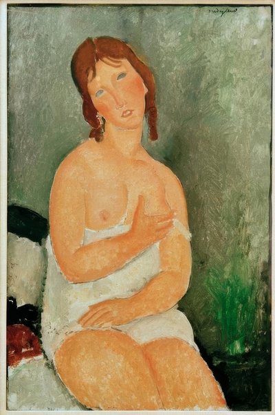 Ung kvinne sitter av Amedeo Modigliani