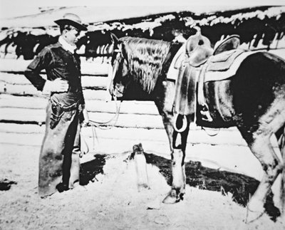 Butch Cassidy (1866-1908/09) med hesten sin (s/hv-bilde) av American Photographer