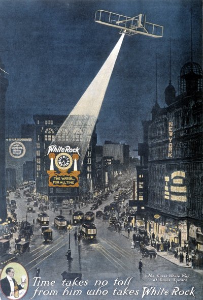 Alkoholreklame "" White Rock"": Et fly som lyser opp "White Rock"-plakaten som henger på en bygning på Times Square i New York. 1912. av American School