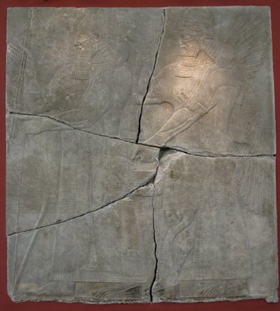 Kong Ashurnasirpal II og hans Gud. Relieff fra palasset til Ashurnasirpal II i Kalhu, Nimrud, 900-tallet f.Kr. av Assyrian