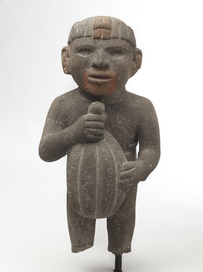 Mann som bærer en kakaopl, 1440-1521 (vulkanstein med spor av rødt pigment) av Aztec