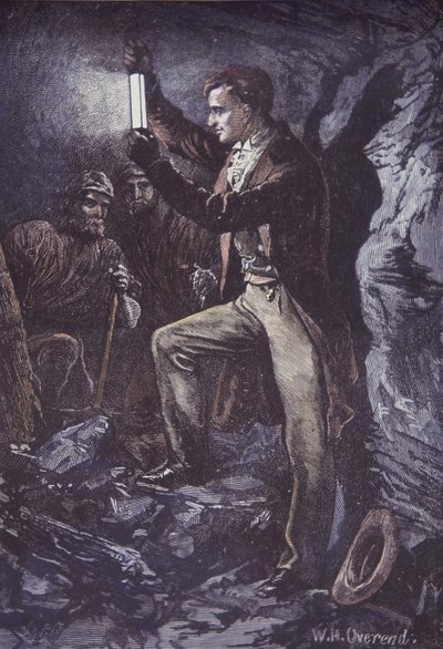 Humphry Davy med Davy sikkerhetslampe for gruvearbeidere, oppfunnet i 1815 (håndfarget tregravering) av British School