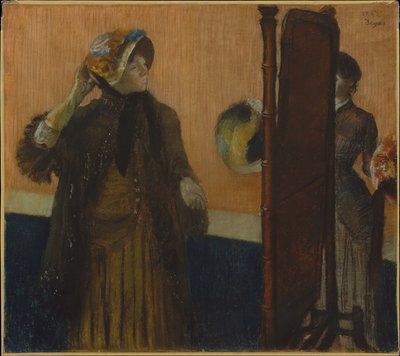 Hos hattehandleren av Edgar Degas