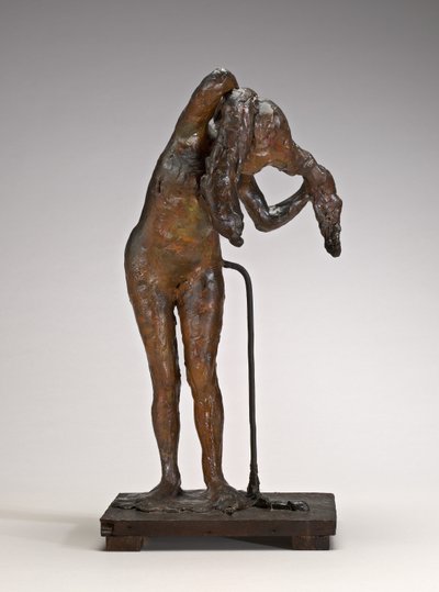 Kvinne som ordner håret hennes, muligens sent på 1880-1890-tallet. av Edgar Degas