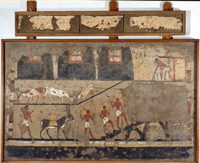 Egyptisk antikvitet: transport av hvete på ryggen av muldyr og på ryggen til menn. Detrempe på leire og halm fra graven til generalen og kansleren til kong Iti i El Ghebelen nær Luxor. 2200-2000 f.Kr. Torino, egyptisk museum av Egyptian Egyptian