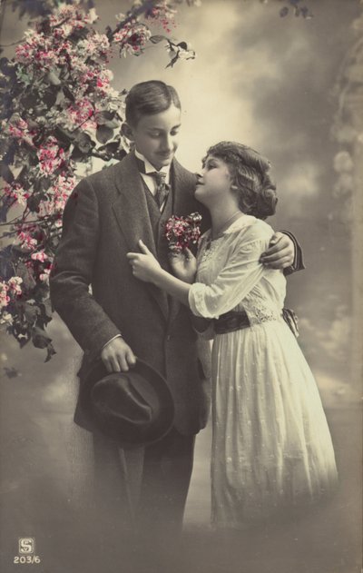 Par under et blomstrende tre av English Photographer
