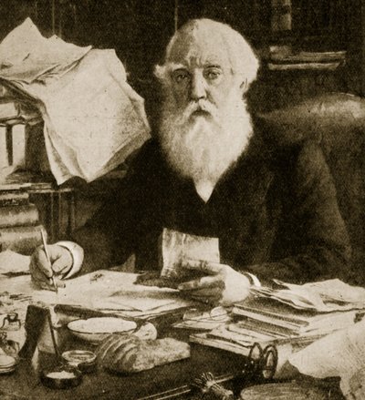 Austen Henry Layard sitter ved skrivebordet sitt av English School
