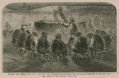 Atlanterhavskabelen; Betaler kabelen inn i lasterommet til Agamemnon av English School