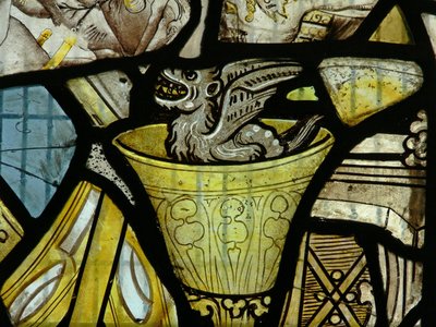 Vindu s3 som viser en djevel i en kalk - sannsynligvis fra et panel av St John av English School