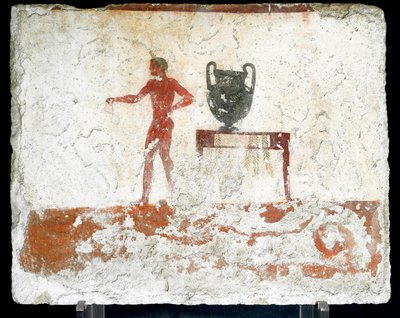 Etruskisk kunst: en ung naken ephebe nær et bord hvor en vase er plassert. Freske av graven til "dykkeren". Fra den sørlige kirkegården i Paestum. 480-470 f.Kr. Museo Archeologico Nazionale, Paestum av Etruscan