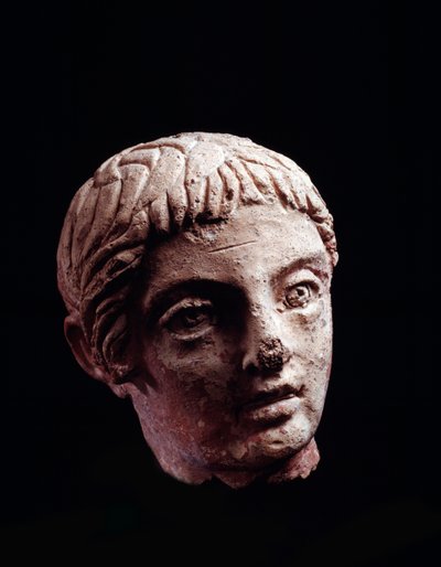 Etruskisk sivilisasjon: hodet til en ung mann fra tempelet Belvedere, i Orvieto - 5.-4. århundre f.Kr. Diam 13 cm av Etruscan