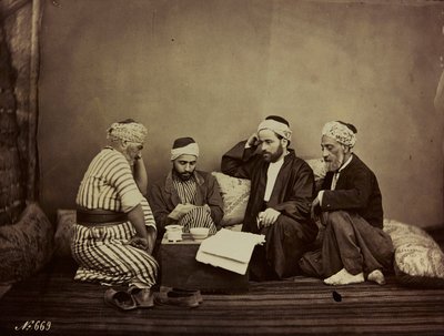 Album Damas et Baalbek : En gruppe syrere som sitter rundt et bord av Félix Bonfils