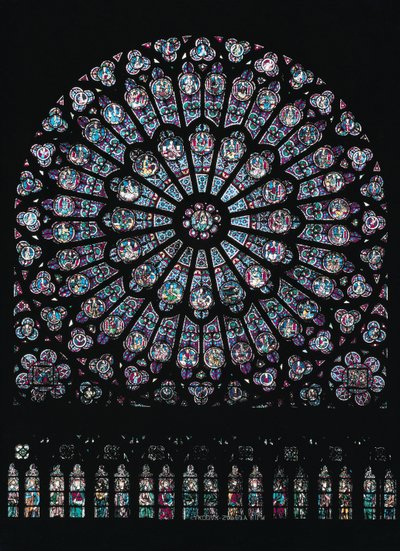 Det nordlige tverrarmsrosevinduet viser jomfruen og barnet i sentrum omgitt av gammeltestamentlige tegn, ca. 1250 av French School