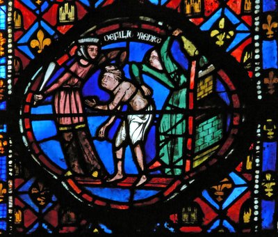 Window Ew-L som viser en scene fra historien om den fortapte sønnen: han blir kastet ut av coutesanene av French School