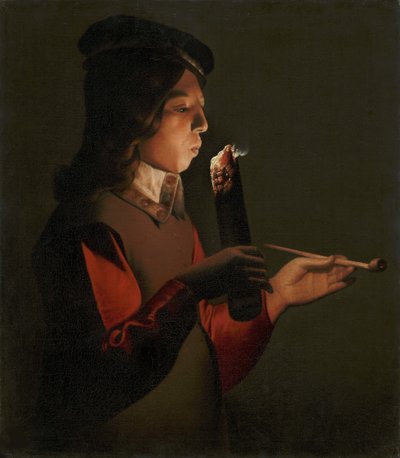 En ung gutt med en pipe, som blåser på et ildsted, av La Tour, Georges, de (1583-1652). olje på lerret av Georges de La Tour