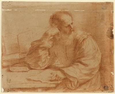 En skjeggete mann sitter ved bordet av Guercino