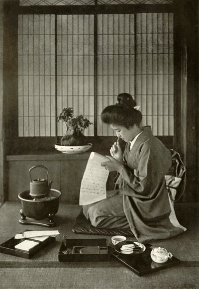 Skriver et brev, 1910. av Herbert Ponting