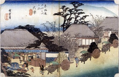 Bønder som krysser en landsby med vognene sine - japansk trykk av Japanese School