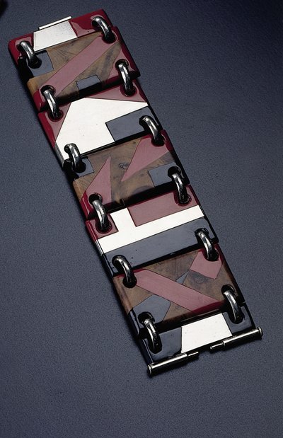 Thuya armbånd, ca. 1930 (forkrommet svart og rød lakk) av Jean Dunand