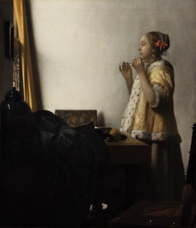 Ung dame med perlekjede av Johannes Vermeer