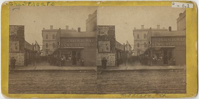 Utsikt over John R. Walsh Periodicals-butikken på Madison Street, Chicago med postkontoret i bakgrunnen, 1869 av John Carbutt