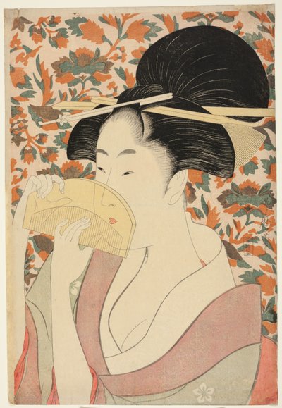 Kvinne som holder et skilpaddeskall hårkam av Kitagawa Utamaro