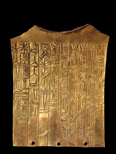 Mesopotamia: gullvotivplate i form av et skjegg dedikert til guden Sara. Den er dekket med kileskrift. Fra Ummah. 2370 f.Kr. Paris, Louvre-museet av Mesopotamian Mesopotamian