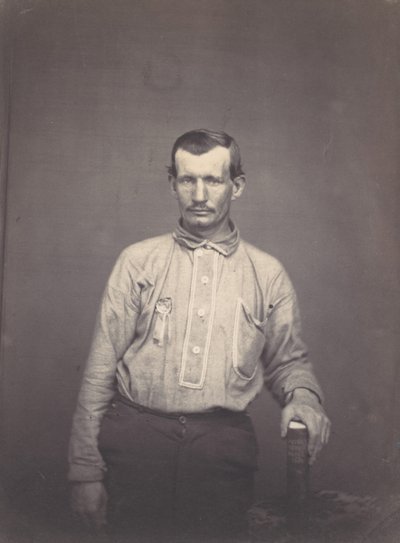 Mann med patentkontorbok, ca. 1857. av Oliver H. Willard.