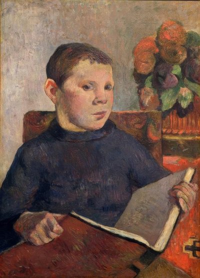Portrett av sønnen Clovis med en bok av Paul Gauguin