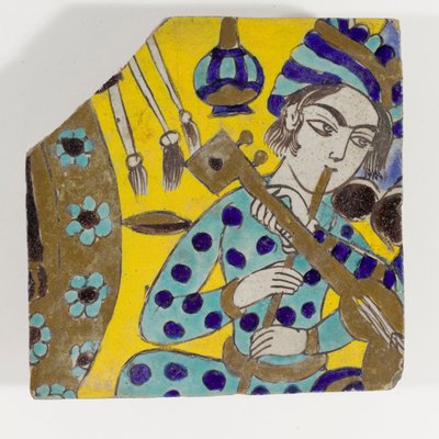 En Safavid Persia cuerda seca keramikkflis fra slutten av 1600-tallet som viser en mann som spiller en fløyte i en turban av Persian School
