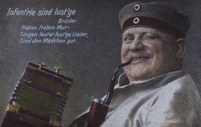 Tysk soldat røyker pipen (farget bilde) av Photographer German