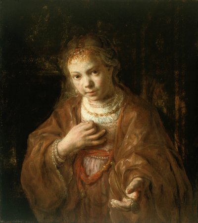 Ung jente som holder en medalje av Rembrandt