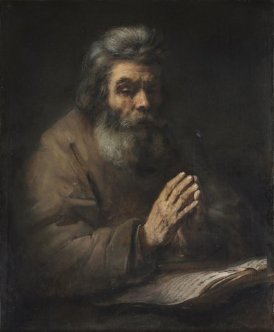 En eldre mann i bønn av Rembrandt van Rijn