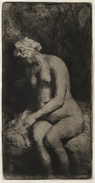 Kvinne som bader føttene i en bekk av Rembrandt van Rijn
