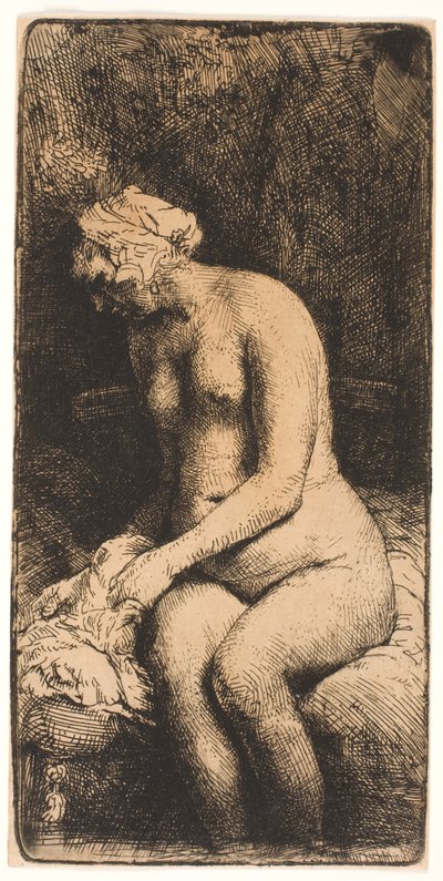 Kvinne som bader føttene ved en bekk av Rembrandt van Rijn