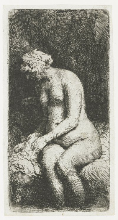 Kvinne som bader føttene ved en bekk av Rembrandt van Rijn