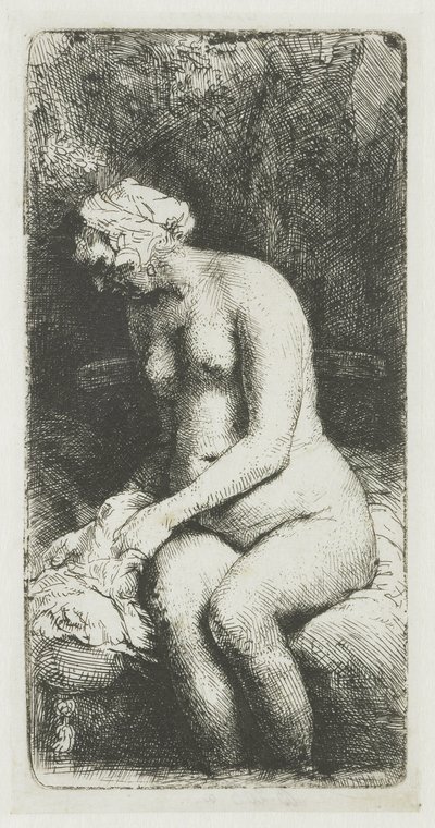 Kvinne som bader føttene ved en bekk av Rembrandt van Rijn